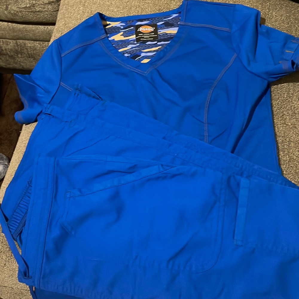 Worn once. Bundle of XX-Small top and bottom scrubs.